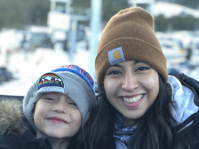 Leslie Del Rio, Parent Advisor, with son