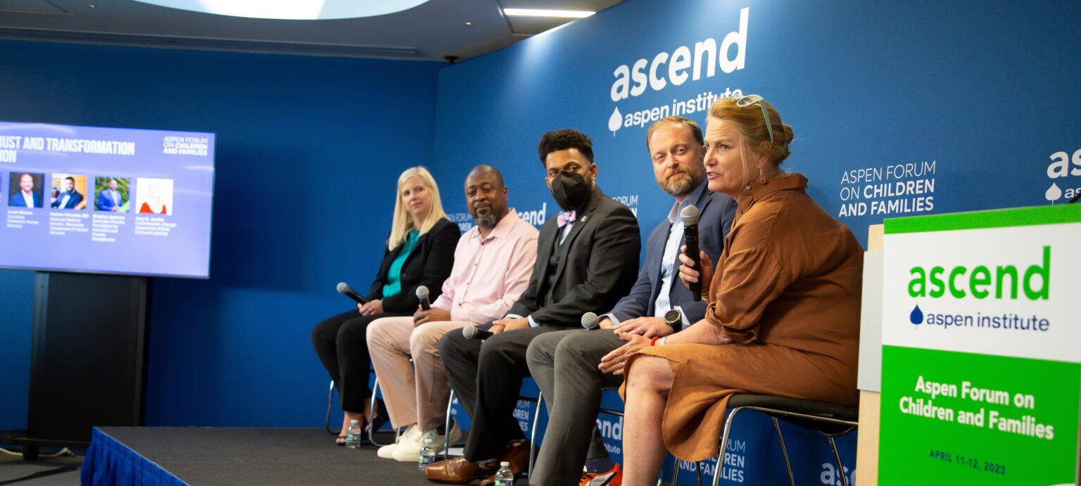 Photo from the 2023 Aspen Forum on Children and Families featuring a session with Amy Jacobs, Drayton Jackson, Nathan Chomilo, Justin Brown, and Anne Mosle on stage.