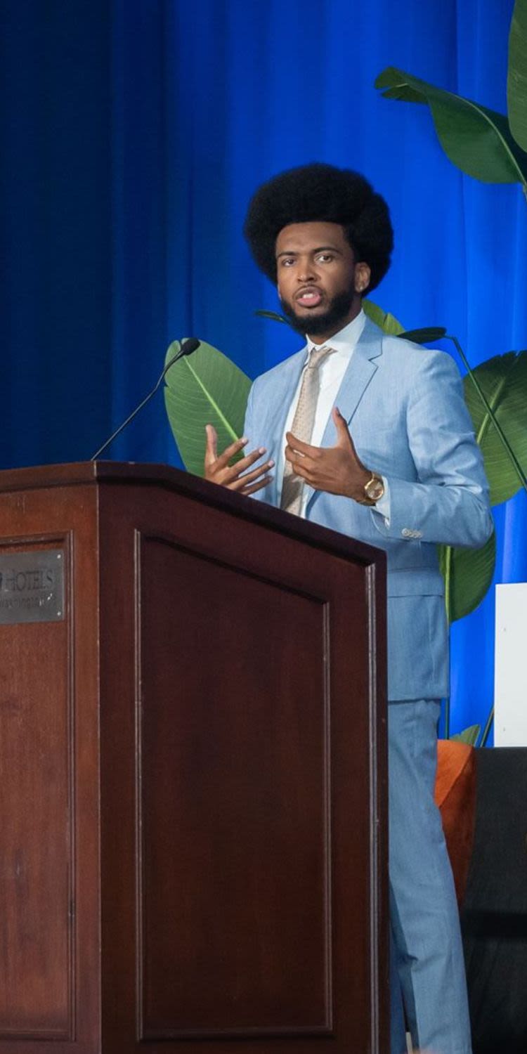 Clinton speaking on stage